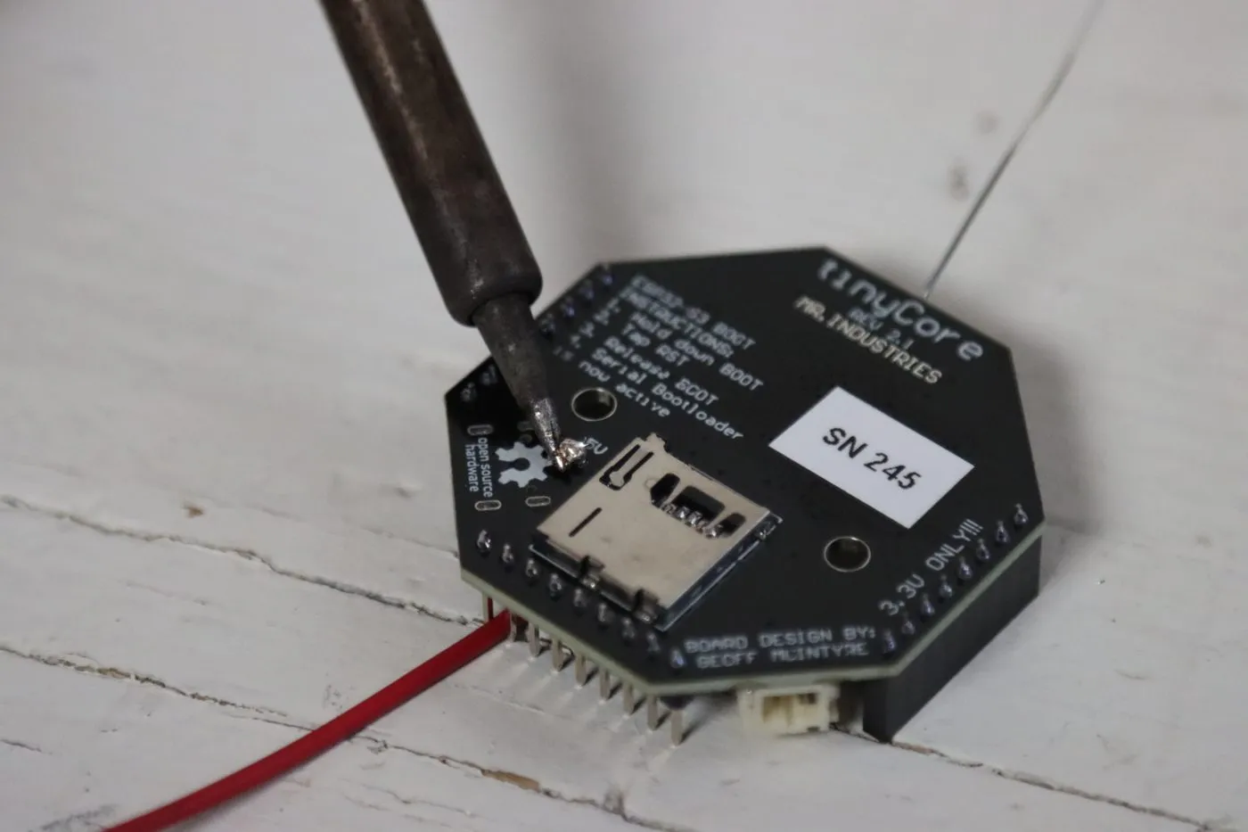 Soldering the wire on the bottom of the tinyCore