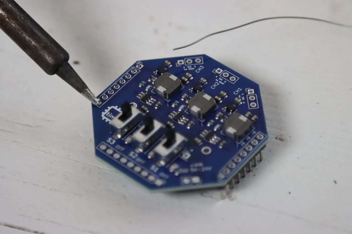 Soldering the header pins on top of the tinyGlow